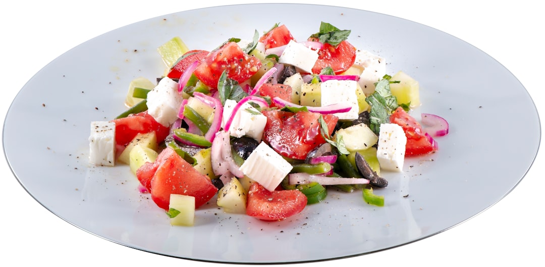 Mediterranean salad with greens tomatoes olives feta and grilled chicken